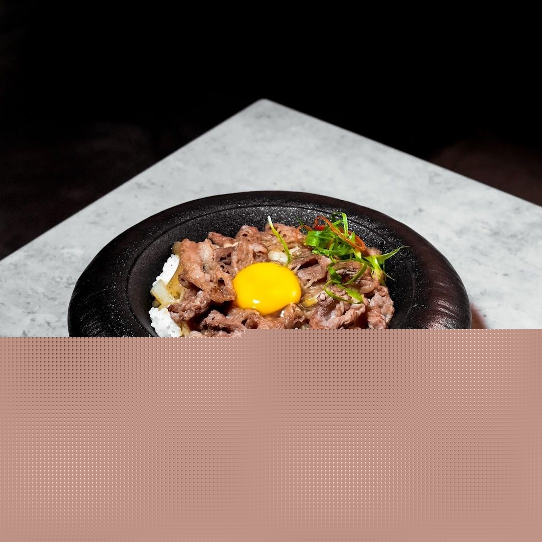 Gyudon beef bowl with egg yolk — Japanese cuisine at Grotto